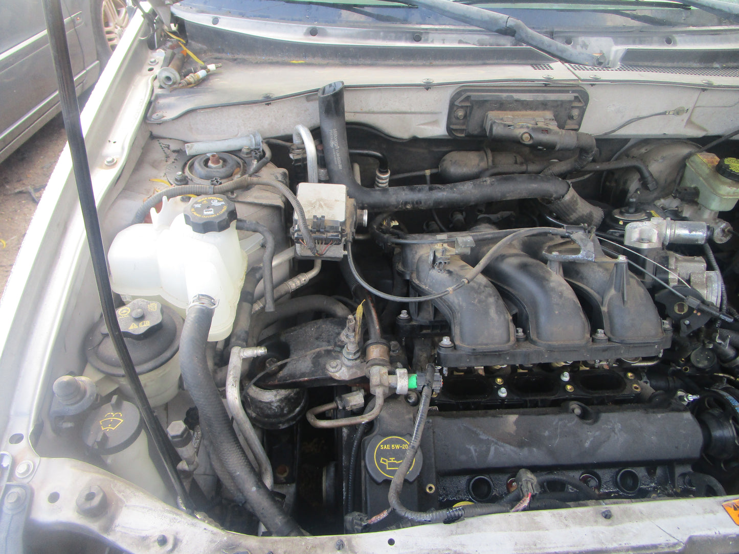 1/2 2001 - 2007 Ford Escape | All Parts A - F | SKU #: 16713 CM-3